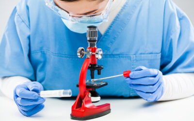 Medical worker UK lab technician microscope examining Coronavirus patient swab test tube sample specimen Medical worker UK lab technician microscope examining Coronavirus patient swab test tube sample specimen,COVID-19 rt-PCR (real time reverse transcription polymerase chain reaction) testing procedure